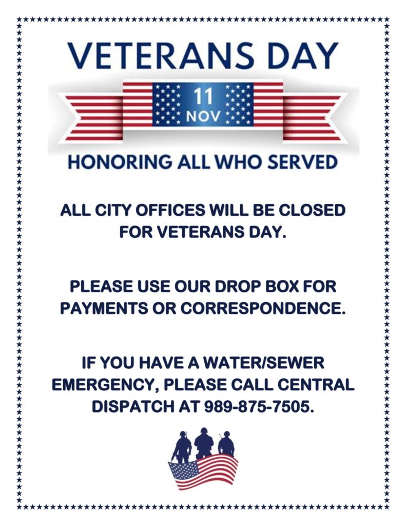 Veterans Day office closure notice with emergency contact.